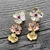 Picture of Classic Medium Dangle Earrings at Unbeatable Price