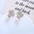 Picture of Delicate Cubic Zirconia Gold Plated Dangle Earrings