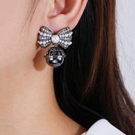 Picture of Low Cost Platinum Plated Bow Dangle Earrings with Low Cost