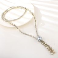 Show details for Shop Copper or Brass shell pearl Y Necklace with Wow Elements Show details for Shop Copper or Brass shell pearl Y Necklace with Wow Elements